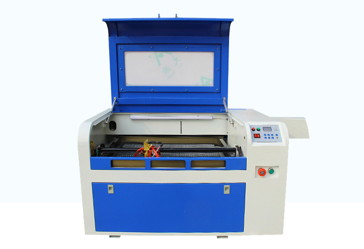 آلة نقش وقطع بالليزر CO2 صناعي - مراجعة Industrial Laser Engraver For Wood وسعره